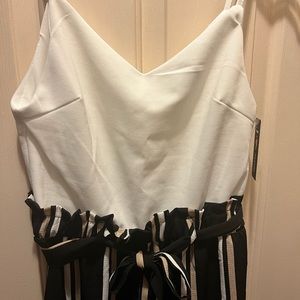 Jumpsuit with white tank top and paper bag style attached pants. NWT.